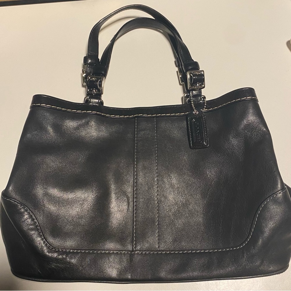 Coach Hampton’s Black leather satchel